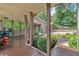 Covered deck with outdoor seating and beautiful landscaping, ideal for outdoor entertaining at 52 Waterside Se Dr, Cartersville, GA 30121