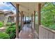 Spacious covered deck with seating area, providing a relaxing outdoor living space at 52 Waterside Se Dr, Cartersville, GA 30121