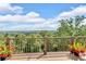 Well-built wooden deck surrounded by lush greenery, offering breathtaking views of the landscape at 52 Waterside Se Dr, Cartersville, GA 30121