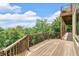 Relaxing outdoor deck features stunning views and natural wood at 52 Waterside Se Dr, Cartersville, GA 30121