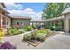 Beautiful home exterior with landscaped gardens and stone pathway at 52 Waterside Se Dr, Cartersville, GA 30121