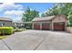 Spacious three-car garage and well-manicured landscaping at 52 Waterside Se Dr, Cartersville, GA 30121