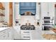 Close up of kitchen showcasing stainless steel oven and a range hood at 52 Waterside Se Dr, Cartersville, GA 30121