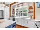 Farmhouse sink and countertops with stainless steel appliances at 52 Waterside Se Dr, Cartersville, GA 30121
