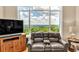 Inviting living room featuring a scenic view through a large picture window at 52 Waterside Se Dr, Cartersville, GA 30121