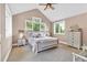 Comfortable main bedroom with vaulted ceiling and multiple windows at 52 Waterside Se Dr, Cartersville, GA 30121