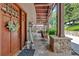 Charming front porch with stone accents and inviting decor at 52 Waterside Se Dr, Cartersville, GA 30121