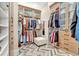Organized walk-in closet with ample storage and custom shelving at 52 Waterside Se Dr, Cartersville, GA 30121