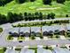 Aerial view of homes near a lush green golf course, showcasing the neighborhood's premium location at 6468 Panasa Ct, Tucker, GA 30084