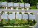 Bird's eye view of a neighborhood featuring neat homes and driveways, presenting a serene community setting at 6468 Panasa Ct, Tucker, GA 30084