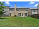 Large backyard with a well-maintained lawn, perfect for outdoor activities and entertaining at 6468 Panasa Ct, Tucker, GA 30084