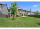 Large backyard with green grass and privacy fence creating an inviting outdoor space at 6468 Panasa Ct, Tucker, GA 30084