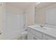 Bathroom with a tub-shower combo and a single sink vanity, designed for functionality and comfort with neutral tones at 6468 Panasa Ct, Tucker, GA 30084