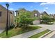 Attractive home featuring a brick facade, well-maintained lawn, and a convenient two-car garage at 6468 Panasa Ct, Tucker, GA 30084