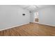 Bright bedroom with hardwood floors, ceiling fan, and access to a full bathroom at 106 Brighton Pt, Sandy Springs, GA 30328