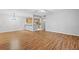 Spacious living room with an open floor plan leading into the kitchen area at 106 Brighton Pt, Sandy Springs, GA 30328