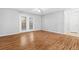 Living room features hard surface floors and glass doors for natural light at 106 Brighton Pt, Sandy Springs, GA 30328