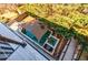 Aerial view of the backyard pool showcasing the unique layout, landscaping, and patio area at 1812 Hunters Gln, Marietta, GA 30062