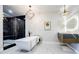 A stylish bathroom features a freestanding tub, marble accents, and modern fixtures for a luxurious experience at 1812 Hunters Gln, Marietta, GA 30062