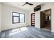 Bright bedroom with large windows and elegant door, featuring attractive wood flooring at 1812 Hunters Gln, Marietta, GA 30062