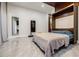 Bedroom with a murphy bed, marble floors, and a decorative accent wall at 1812 Hunters Gln, Marietta, GA 30062