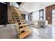 Open-concept living area with modern staircase, stylish furniture, and abundant natural light at 1812 Hunters Gln, Marietta, GA 30062
