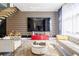 Bright living room featuring modern decor, comfortable seating, and a large entertainment center at 1812 Hunters Gln, Marietta, GA 30062