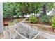 Backyard featuring a patio and multilevel garden perfect for entertaining at 2420 Walnut Grove Way, Suwanee, GA 30024