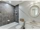 Modern bathroom featuring a granite vanity top and tiled shower at 2420 Walnut Grove Way, Suwanee, GA 30024