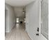 Inviting entryway featuring new floors and paint, and leading into a bright and airy living space at 2420 Walnut Grove Way, Suwanee, GA 30024