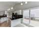 Bright kitchen with granite counters, stainless appliances and window at 2420 Walnut Grove Way, Suwanee, GA 30024