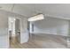 Spacious living room featuring gray walls and a modern chandelier at 2420 Walnut Grove Way, Suwanee, GA 30024