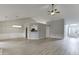 Spacious open-concept living and dining area with plenty of natural light and backyard views at 2420 Walnut Grove Way, Suwanee, GA 30024