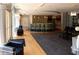 Modern lounge area with a fully equipped bar, contemporary seating, and stylish lighting fixtures at 711 Cosmopolitan Dr # 413, Atlanta, GA 30324