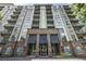 Exterior shot of a high-rise building featuring multiple balconies and modern architectural design at 711 Cosmopolitan Dr # 413, Atlanta, GA 30324