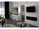 Lobby area with fireplace, accent wall, TV, and sleek seating at 711 Cosmopolitan Dr # 413, Atlanta, GA 30324
