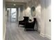 Inviting lobby area with elegant seating, modern decor, and hardwood style flooring at 711 Cosmopolitan Dr # 413, Atlanta, GA 30324