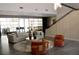 Elegant lobby featuring contemporary furniture, stylish décor, and staircase at 711 Cosmopolitan Dr # 413, Atlanta, GA 30324