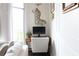 Bright home office with desk, comfortable chair, and natural light from a large window at 711 Cosmopolitan Dr # 413, Atlanta, GA 30324