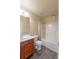Bathroom featuring a vanity with ample storage, a toilet, and a bathtub at 1336 Nathan Mauldin Dr, Lawrenceville, GA 30043