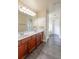 Bathroom features a double sink vanity with ample counter space and storage at 1336 Nathan Mauldin Dr, Lawrenceville, GA 30043