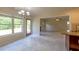 Open breakfast nook with tile floors, large windows, and seamless flow to the living room at 1336 Nathan Mauldin Dr, Lawrenceville, GA 30043