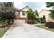 Traditional two-story home with a brick and siding exterior, complemented by a well-maintained lawn and landscaping at 1336 Nathan Mauldin Dr, Lawrenceville, GA 30043