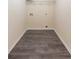 Laundry area with wood grain floors at 1336 Nathan Mauldin Dr, Lawrenceville, GA 30043