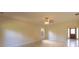 Open-concept living room with tile flooring, neutral walls, and a view of the front entry door at 1336 Nathan Mauldin Dr, Lawrenceville, GA 30043