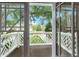 View from balcony features decorative railings and view of landscaped lawn at 2697 N Thompson Ne Rd, Atlanta, GA 30319
