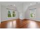 Light-filled bedroom with hardwood floors and beautiful views at 2697 N Thompson Ne Rd, Atlanta, GA 30319