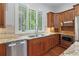 Bright kitchen with natural light, granite countertops, stainless appliances and custom cabinetry at 2697 N Thompson Ne Rd, Atlanta, GA 30319