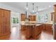 Kitchen with custom wood cabinets, granite countertops, stainless appliances, and central island at 2697 N Thompson Ne Rd, Atlanta, GA 30319