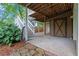 View of the backyard patio and stairs leading to the upper deck with a storage shed at 2697 N Thompson Ne Rd, Atlanta, GA 30319